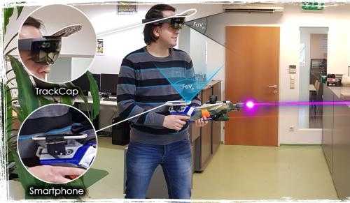 TrackCap: Enabling Smartphones For 3D Interaction on Mobile Head-Mounted Displays